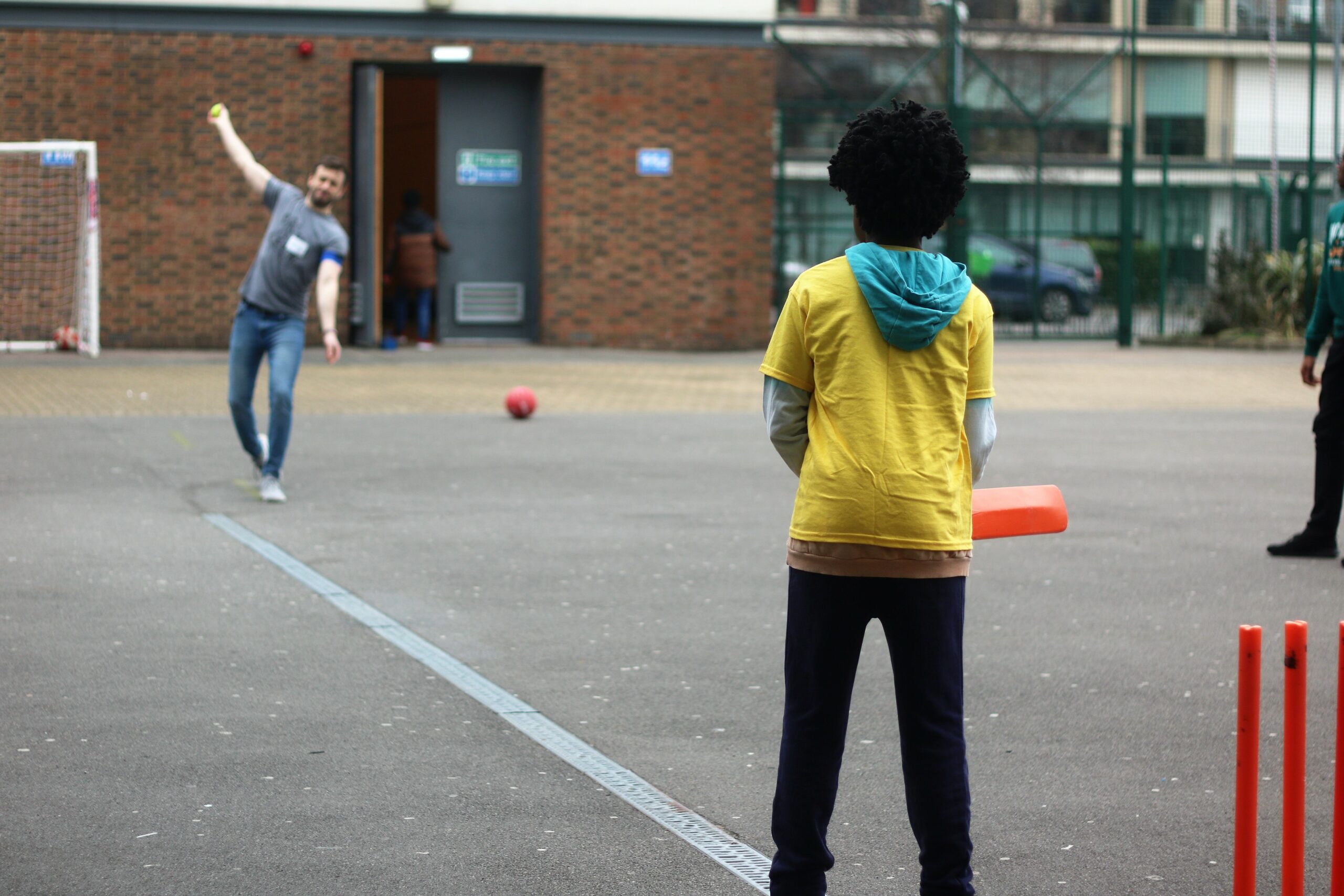 A child playing cricket