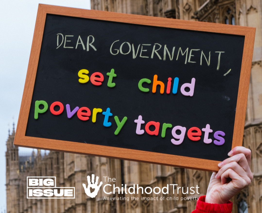 A blackboard which reads "Dear governmnet, set child poverty targets" with The Big Issue's and The Childhood Trust's logo.
